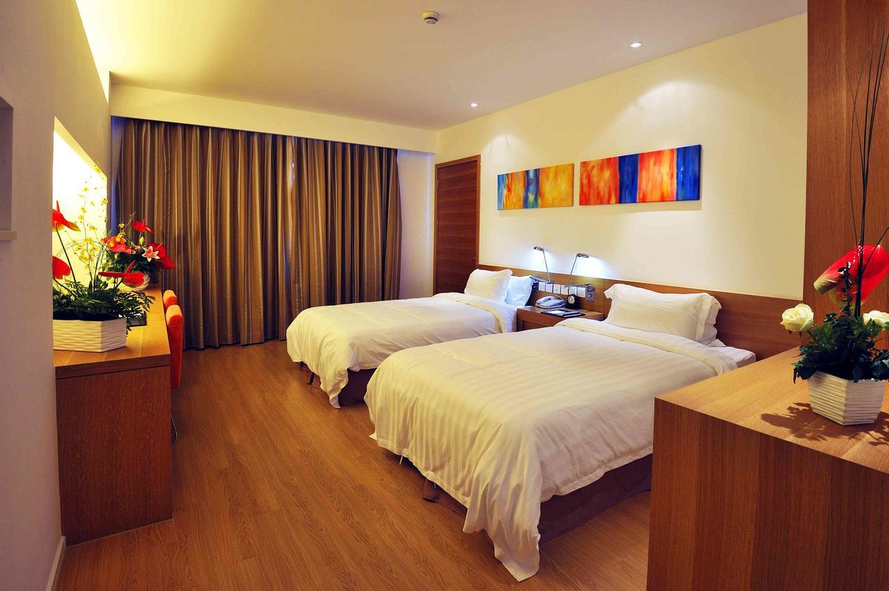 Wisdom Hotel Шанхай Экстерьер фото